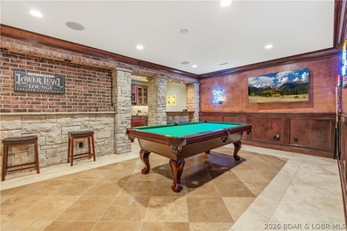 Set on the private waters of Treeline Lake in Four Seasons, this - photo 29