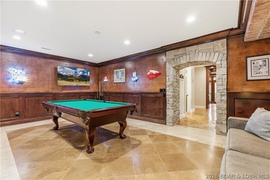 Set on the private waters of Treeline Lake in Four Seasons, this - photo 30