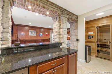 Set on the private waters of Treeline Lake in Four Seasons, this - photo 33