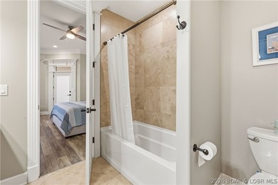 Set on the private waters of Treeline Lake in Four Seasons, this - photo 37