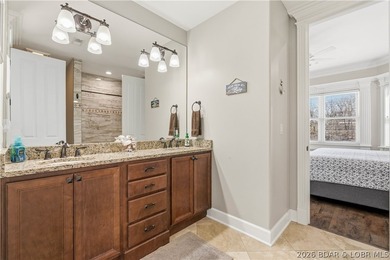 Set on the private waters of Treeline Lake in Four Seasons, this - photo 38