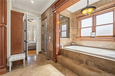 Set on the private waters of Treeline Lake in Four Seasons, this - photo 40
