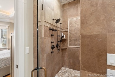 Set on the private waters of Treeline Lake in Four Seasons, this - photo 43
