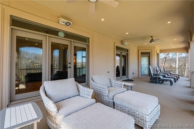Set on the private waters of Treeline Lake in Four Seasons, this - photo 48