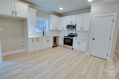 Discover refined lake living in the desirable Stillwater Coves - photo 10