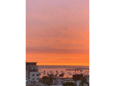 Captivating Bay views and picturesque sunsets await you in this - photo 12