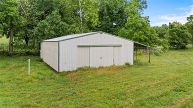 Tucked away on 30 breathtaking acres just minutes from Centerton - photo 7