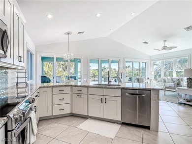 REFINED IMPERIAL RIVER LIVING WITH GULF ACCESS! Waterfront