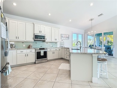 REFINED IMPERIAL RIVER LIVING WITH GULF ACCESS! Waterfront