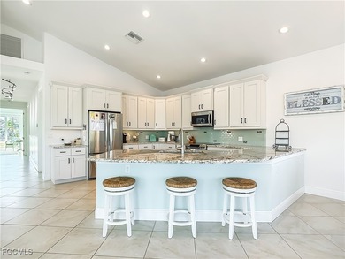 REFINED IMPERIAL RIVER LIVING WITH GULF ACCESS! Waterfront