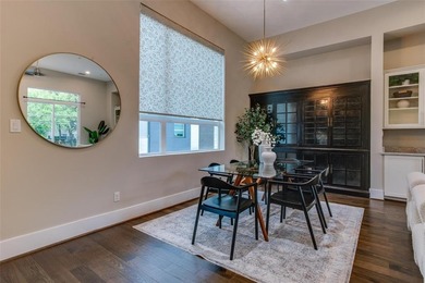 Step into a bold, 4-level townhome that seamlessly marries the