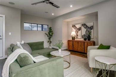 Step into a bold, 4-level townhome that seamlessly marries the