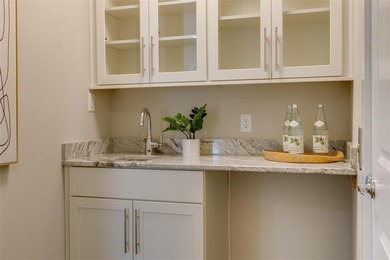 Step into a bold, 4-level townhome that seamlessly marries the