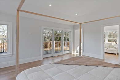 Brand new exquisite waterfront 6 bedroom, 7 bathroom home set on - photo 24