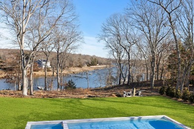 Brand new exquisite waterfront 6 bedroom, 7 bathroom home set on - photo 40