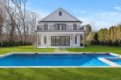 Brand new exquisite waterfront 6 bedroom, 7 bathroom home set on - photo 44