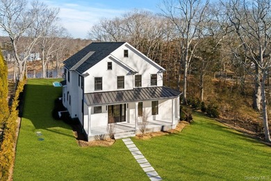 Brand new exquisite waterfront 6 bedroom, 7 bathroom home set on - photo 45