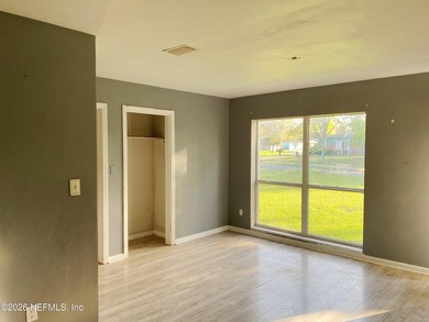 4-bedroom, 2-bathroom concrete block home in the heart of - photo 4