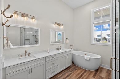 Experience luxury coastal living in this multi-level beach - photo 12