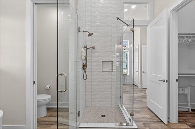 Experience luxury coastal living in this multi-level beach - photo 13