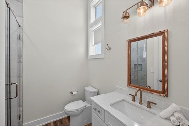 Experience luxury coastal living in this multi-level beach - photo 15