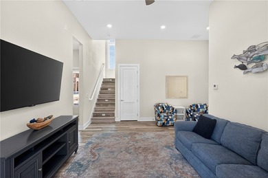 Experience luxury coastal living in this multi-level beach - photo 18