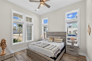 Experience luxury coastal living in this multi-level beach - photo 21