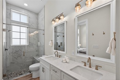 Experience luxury coastal living in this multi-level beach - photo 22