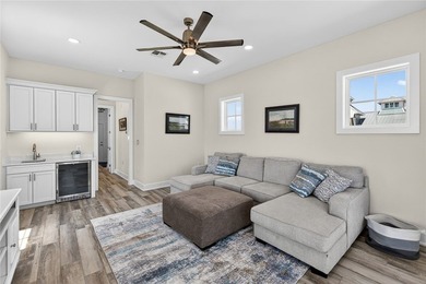 Experience luxury coastal living in this multi-level beach - photo 23