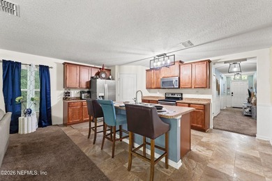 This home features a split bedroom floor plan and open living - photo 4