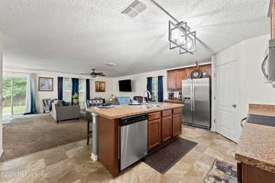 This home features a split bedroom floor plan and open living - photo 6