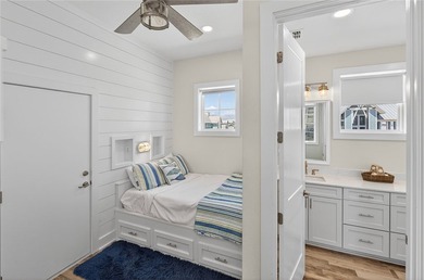 Experience luxury coastal living in this multi-level beach - photo 27