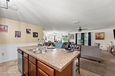 This home features a split bedroom floor plan and open living - photo 7