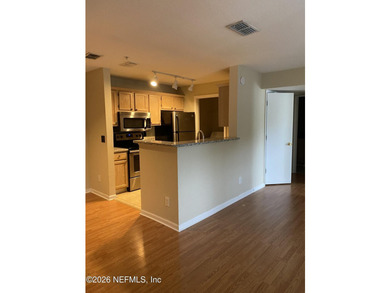 One bedroom, one bathroom condo on second floor. Laminate - photo 2