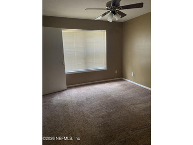 One bedroom, one bathroom condo on first floor. Tile flooring - photo 3