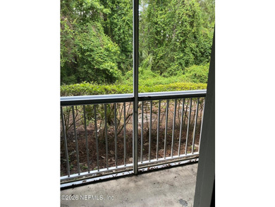 One bedroom, one bathroom condo on first floor. Tile flooring - photo 6