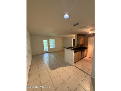 One bedroom, one bathroom condo on first floor. Tile flooring - photo 8