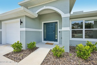 Welcome to this beautifully appointed Seagate custom-built home - photo 2