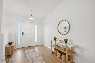 Welcome to this beautifully appointed Seagate custom-built home - photo 4