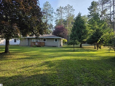 Escape to Northern Michigan at 6302 Loud Drive in Oscoda, where - photo 5