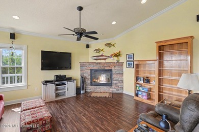 Tucked inside the highly sought-after Pass Christian Isles, this - photo 5