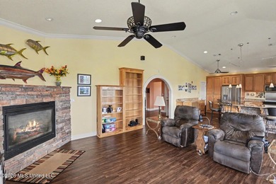 Tucked inside the highly sought-after Pass Christian Isles, this - photo 6
