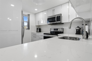 Updated 2/2, top floor, bright, open concept features includes