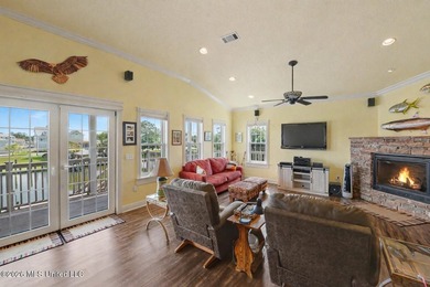 Tucked inside the highly sought-after Pass Christian Isles, this - photo 8