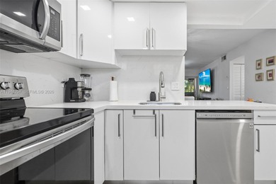 Updated 2/2, top floor, bright, open concept features includes