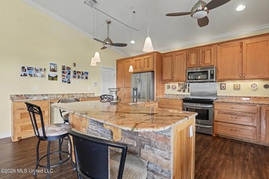 Tucked inside the highly sought-after Pass Christian Isles, this - photo 10
