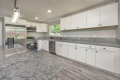 Fully renovated and move-in ready, this spacious 2,268 sqft home - photo 7