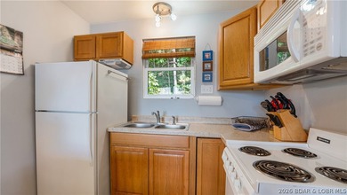 Lake views and easy lake living await! This 2-bedroom, 1-bath - photo 11
