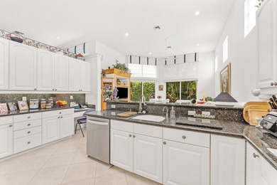 Nestled within the prestigious Woodfield Country Club, this - photo 17
