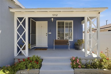 Nestled on a quiet tree lined street in North Long Beach, this - photo 5
